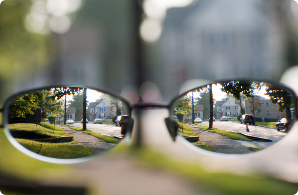 Street view seen through lenses that correct myopia