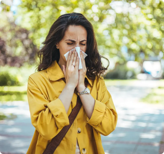Woman experiencing seasonal allergy symptoms